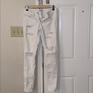 white torn skinny jeans